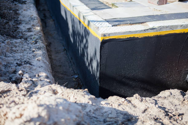 Professional Wet Basement Repair technician working in Upland, IN